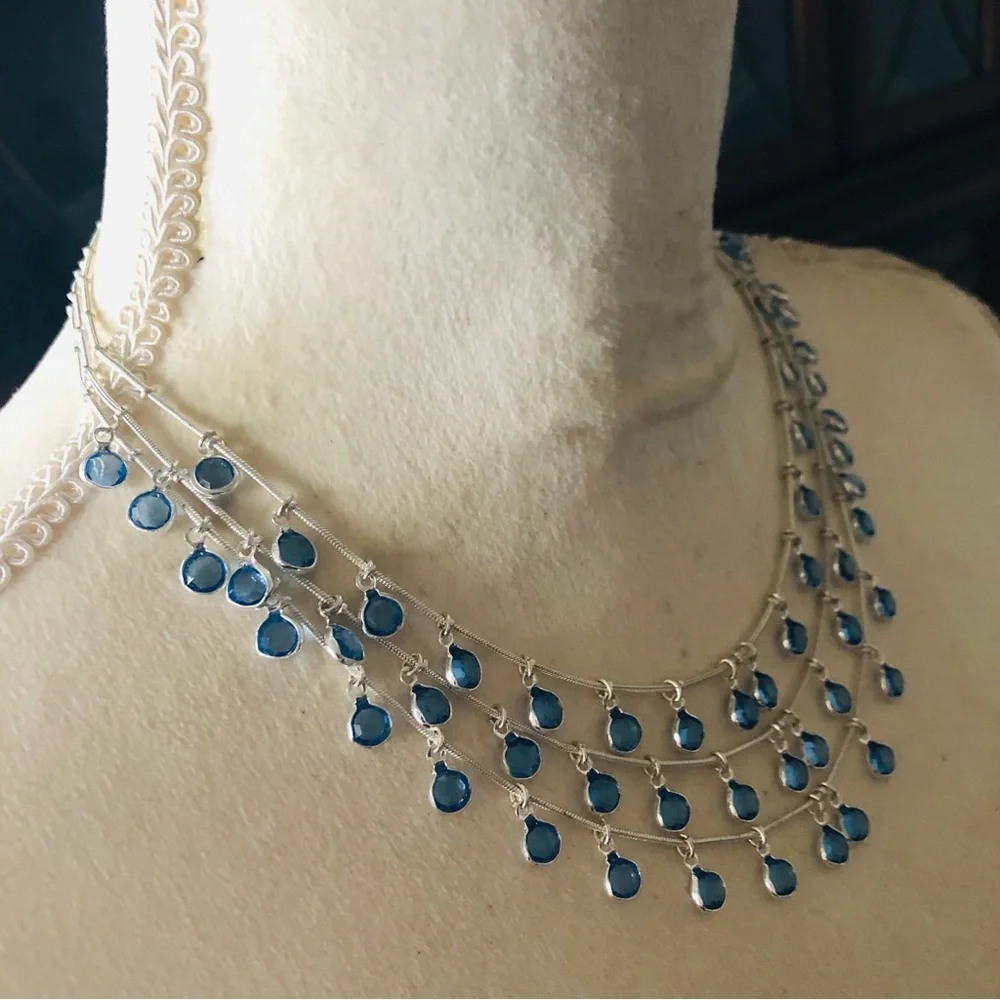 Vintage Anne Klein lion triple strand framed blue crystal dangle necklace